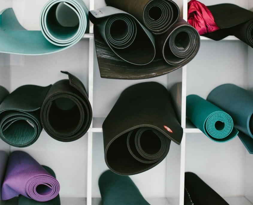 black and white speakers on white shelf